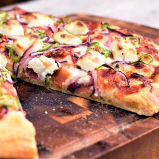 Let's just slow down and savor these beautiful words: jalapeño. bacon. cream cheese. pizza. Yep, this is definitely all kinds of good.