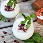 Simple 4-ingredient cocktail balancing rich, creamy coconut cream with bright fresh mint is perfect for whipping up at a last-minute holiday party!