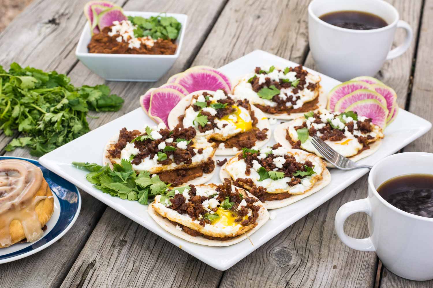 Spicy chorizo + smoky adobo refried beans + gooey fried eggs are perfectly paired for maximum morning happiness, whether it's weekend brunch or a weekday treat.